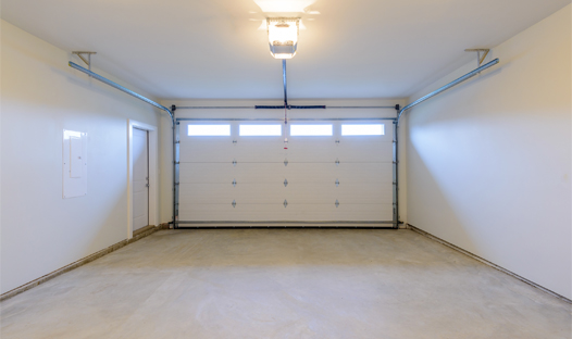 This image shows a garage floor with epoxy painted floor.
