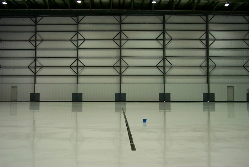 This image shows a warehouse with epoxy floor.
