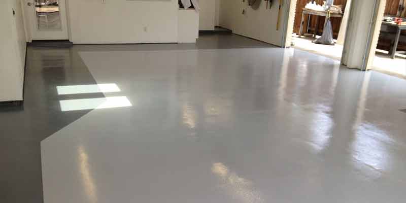 This image shows an Industrial building with a gray and dark gray epoxy floor.
