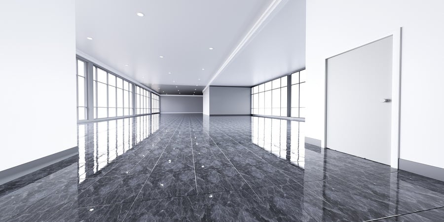 This image shows an empty office with a shiny floor.