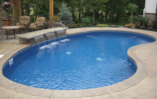 This image shows a pool deck that will be resurfaced because it has a worn out deck.