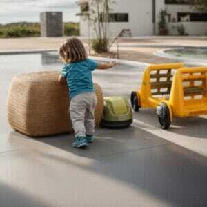 residential epoxy flooring This image shows a kid playing.